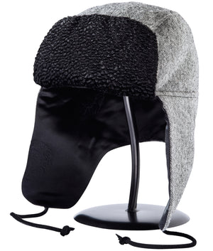Image of a black and white wool Trapper of Colorado brand dressy "trapper hat" or "bomber hat" with black satin lining and black faux fur vegan brim for men or women to wear