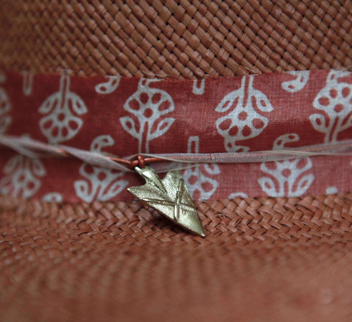"High Noon" Hat - Terra Cotta Straw with Orange Silk Band & Gold Arrowhead Pendant